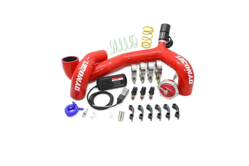 Red Dynojet intake system with black and silver parts for powersports engine rebuilds