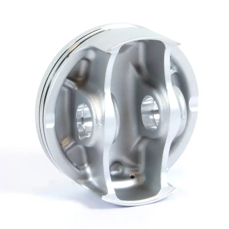Silver-colored piston kit forged nikasil cross-section showing internal structure and pin bores