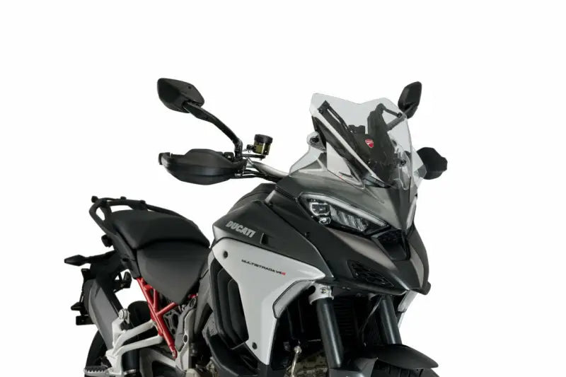 Black and silver adventure motorcycle with sport windscreen in RV parts & accessories section