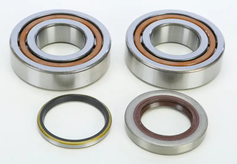 Two tapered roller bearings and oil seals from the 23.CBS63006 seal kit for KTM crankshaft replacement