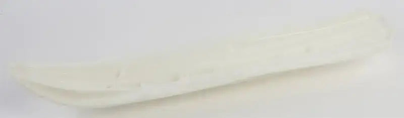 Light-colored boat-shaped ceramic dish for Powder Pro Ski Bottom product display