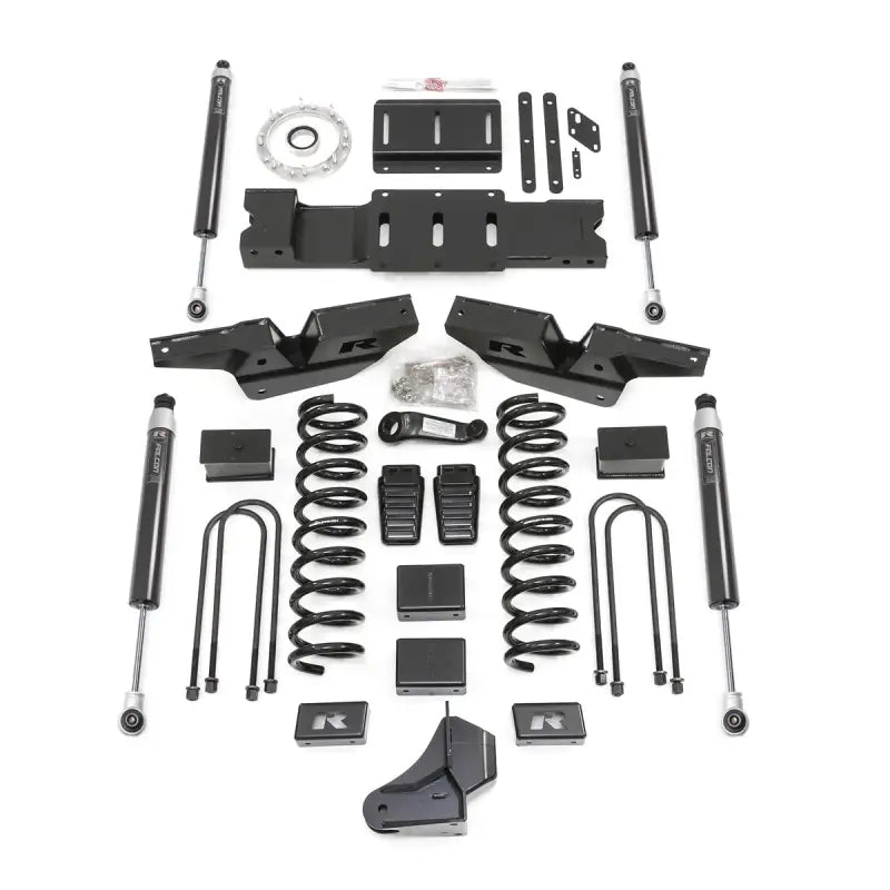 Black truck lift kit with Falcon shocks for increased ground clearance