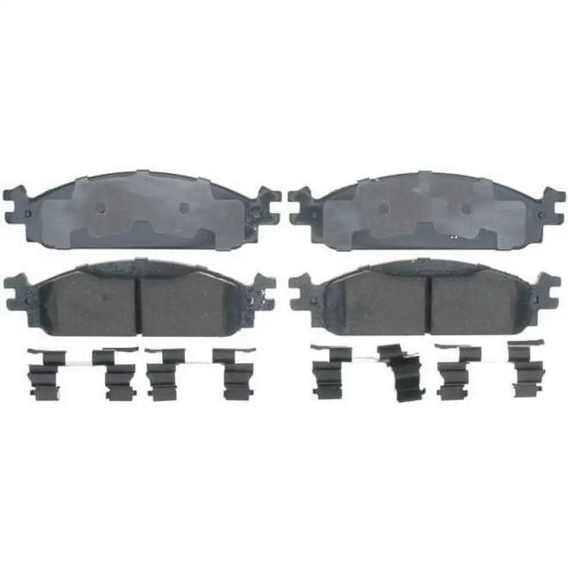 Four brake pads with clips for Raybestos Disc ROTR brake system replacement