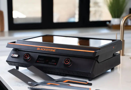 Cook indoors or outdoors with the 8001 Blackstone E-Series 22' Electric Tabletop Griddle's ceramic titanium surface.