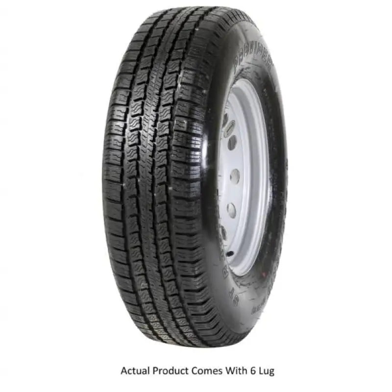 Mounted Taskmaster ST225 75R15 tire with deep tread on a 15x6 wheel