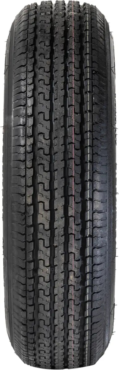 Black tire with symmetrical tread pattern on adb15r555smdm Taskmaster St205/75R15