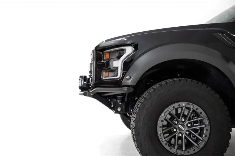 Black Ford Raptor front end with Addictive Desert Designs Hammer Black light hoop