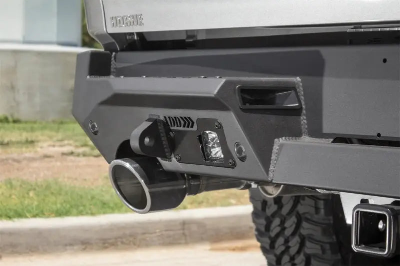 Gray truck rear bumper with exhaust pipe for Addictive Desert Designs Hammer Stealth Fighter