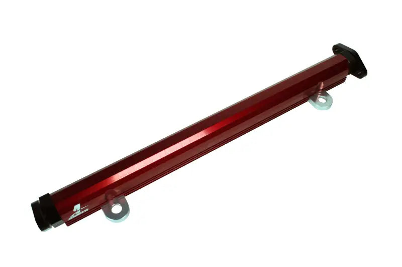Red billet fuel rail with black end caps from Aeromotive Evo fuel rail kit
