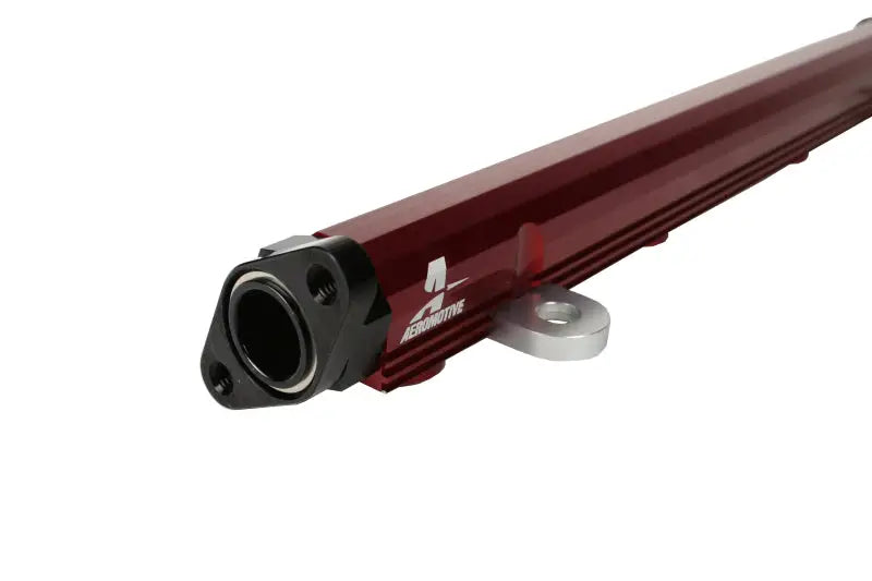 Maroon billet fuel rail with black end from Aeromotive 03-07 Evo fuel rail kit