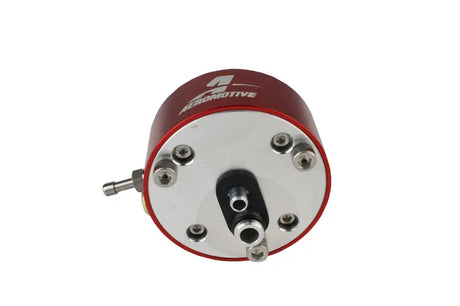 Aeromotive 86-93 Ford 5.0 Billet Adjustable Regulator, red and silver with multiple ports and sleek engineering.