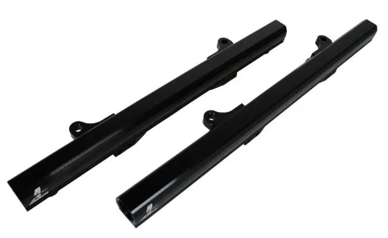 Two black Aeromotive Fuel Rail Ford 5.0L 4V for high-performance fuel delivery