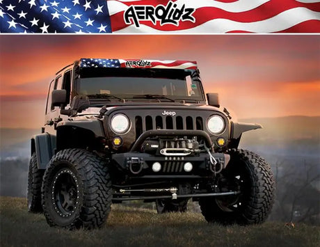 Black Jeep Wrangler with Aerolidz American Flag visor showcasing American flag style aerodynamic accessory
