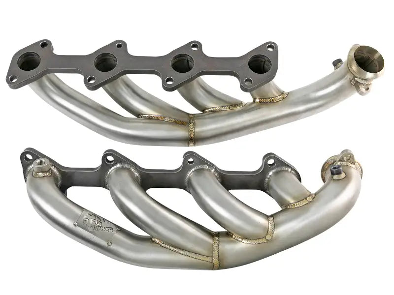 Two stainless steel exhaust manifolds for aFe Twisted Steel Headers on Ford V8 diesel trucks