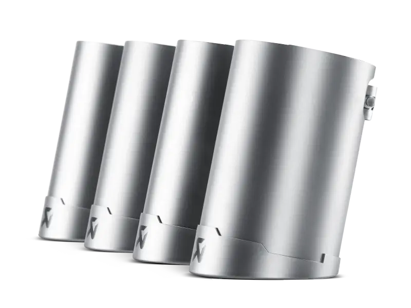 Four shiny silver exhaust tips from the Akrapovic tail pipe set for BMW M3 E90