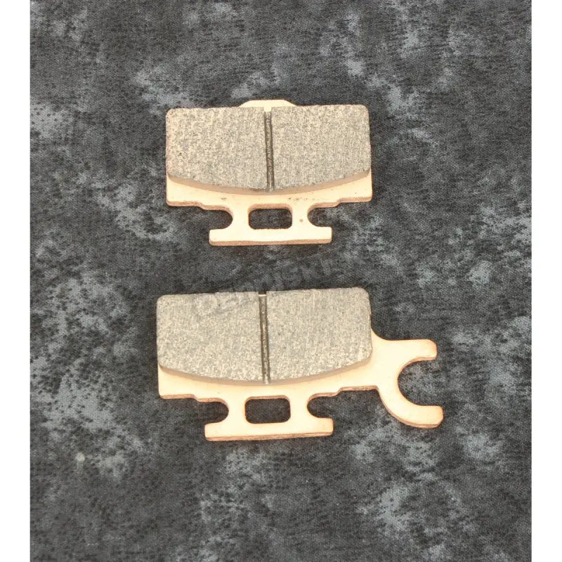 Two motorcycle brake pads from All Balls 18-8069 brake pad kit for demanding riding conditions