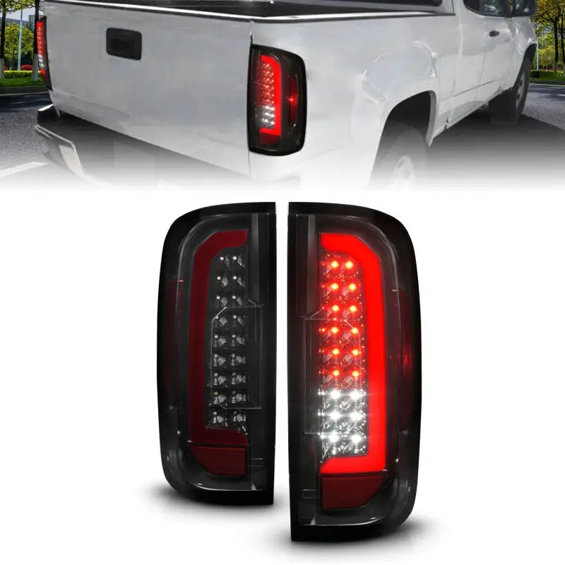 Truck LED tail lights on ANZO 15-21 GMC Canyon with black housing smoke lens