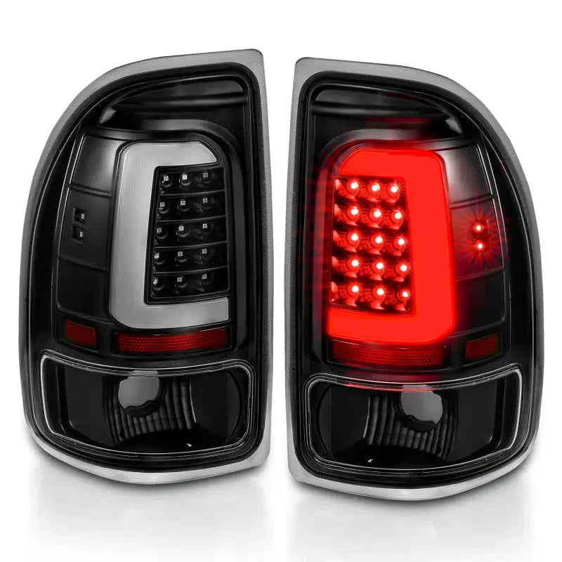 Dodge Dakota LED taillights black housing clear lens pair, one illuminated red for auto style