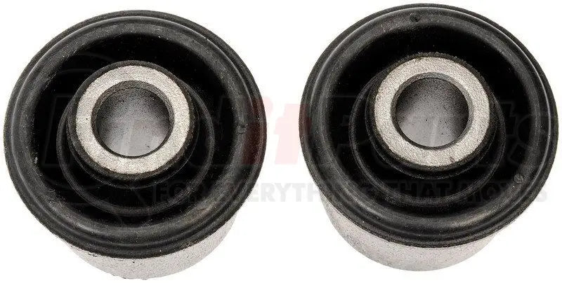 Two black rubber BC69116 Dorman Bushing with metal centers for auto repairs