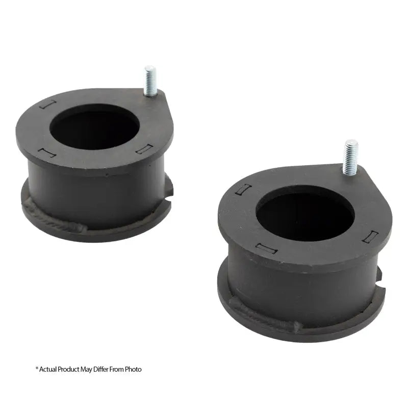 Black cylindrical Dodge Ram strut spacers with bolts for 2.5in lift, lifetime warranty