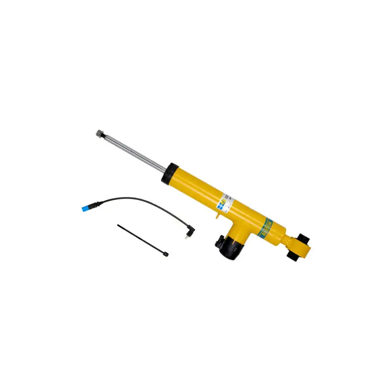 Yellow Bilstein shock absorber with electrical connector for BMW 328i rear twintube shock