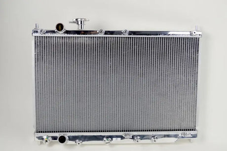 Silver aluminum Honda S2000 radiator for improved cooling and performance