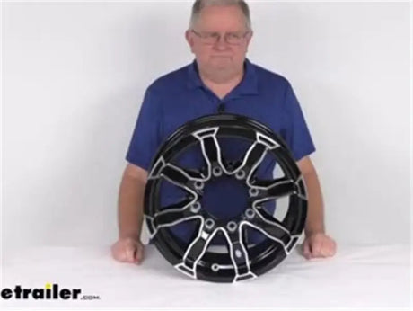 Black and silver trailer wheel with CXF105B Taskmaster Cap fits 16X tires