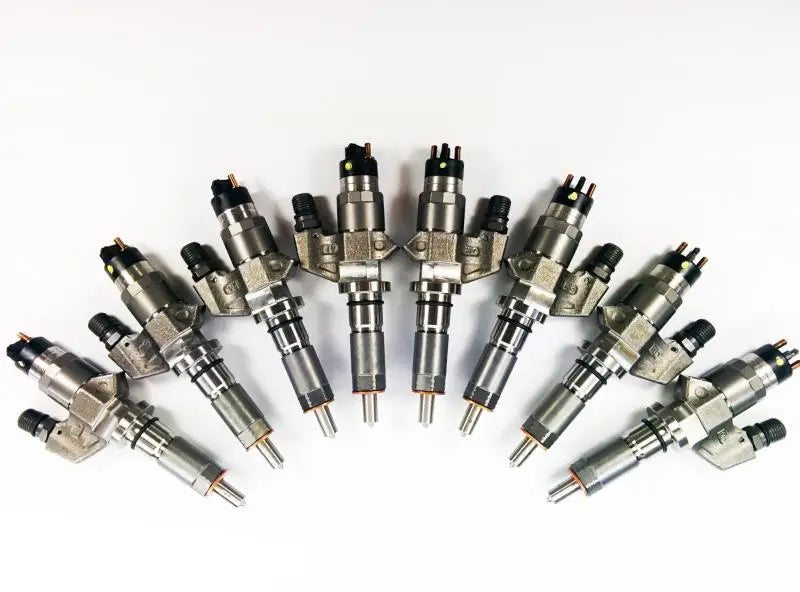 DDP Duramax reman injector set with diesel fuel injectors in a semi-circle layout