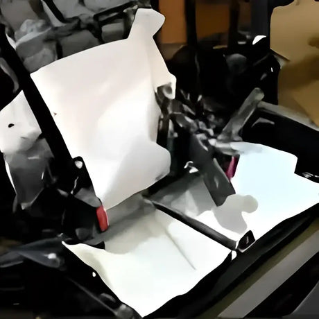 Black metal frame with tools for Honda Pioneer seat heat shield kit installation