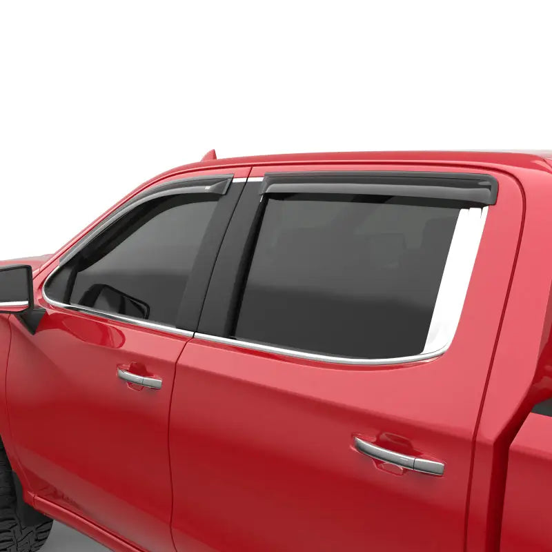 Red Chevy 1500 Crew Cab pickup truck with EGR window visors in dark smoke