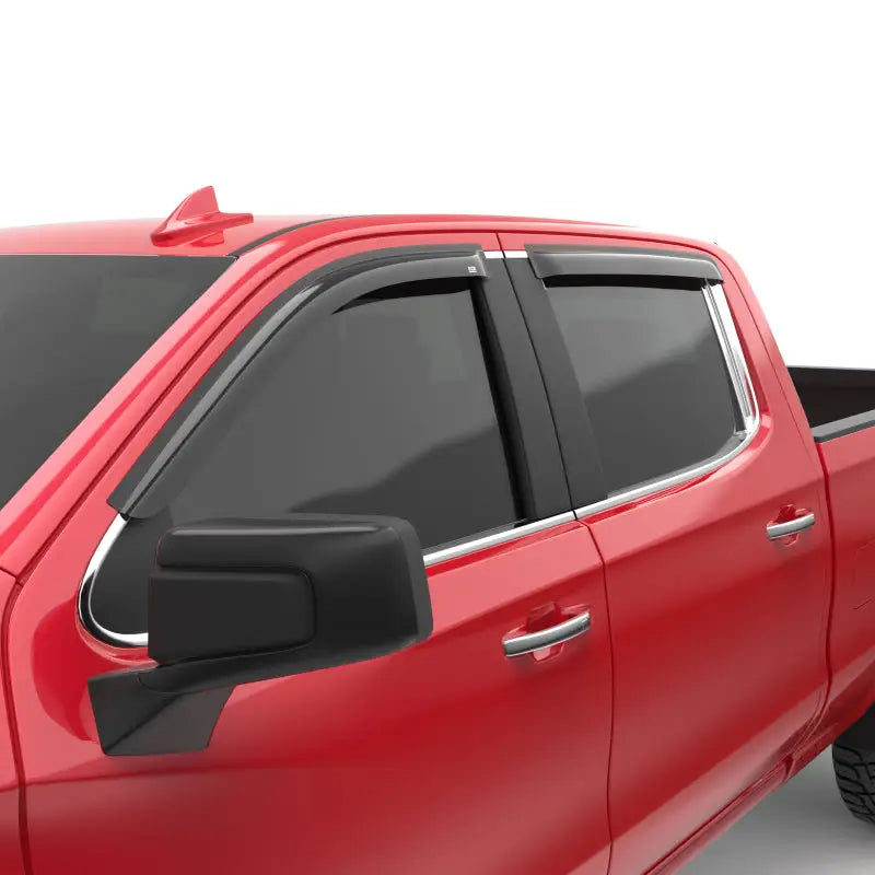 Red Chevy 1500 truck with EGR dark smoke window visors installed for style and protection