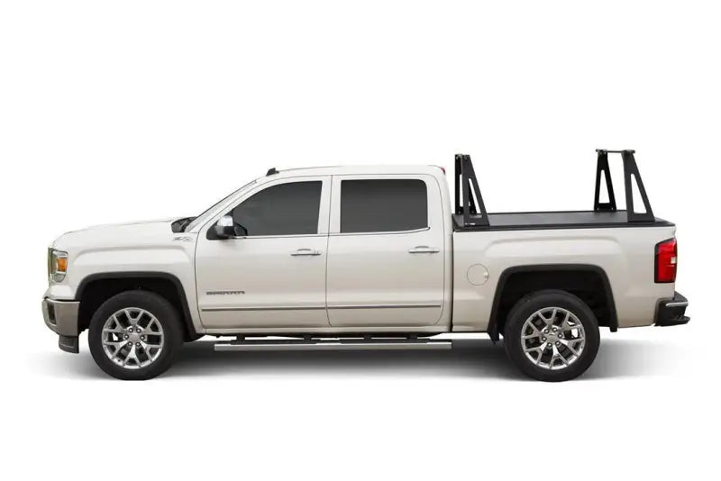White GMC Sierra truck bed with ELC0401 Pace Edwards truck bed rack and tonneau cover