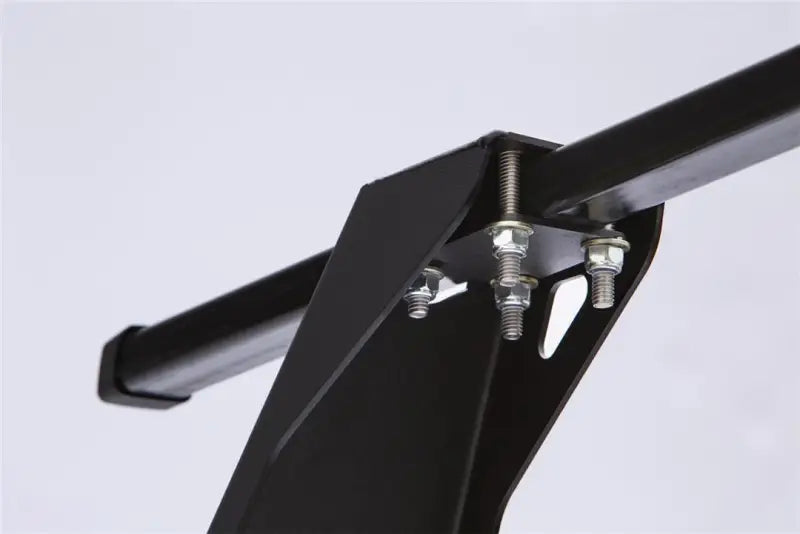 Black metal bracket with bolts on Pace Edwards Truck Bed Rack ELC0401 for truck bed setup