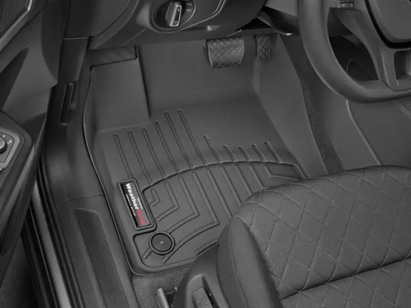 Black floor liner molded fit with channels and reservoir, WeatherTech TPO material