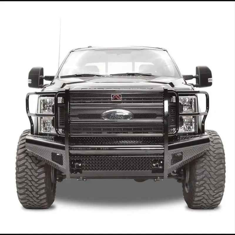 Front view of a Ford F250-550 equipped with the FS17-S4160-1 Fab Fours Ranch Front Bumper, showcasing its robust and aggressive design for enhanced off-road performance and protection.