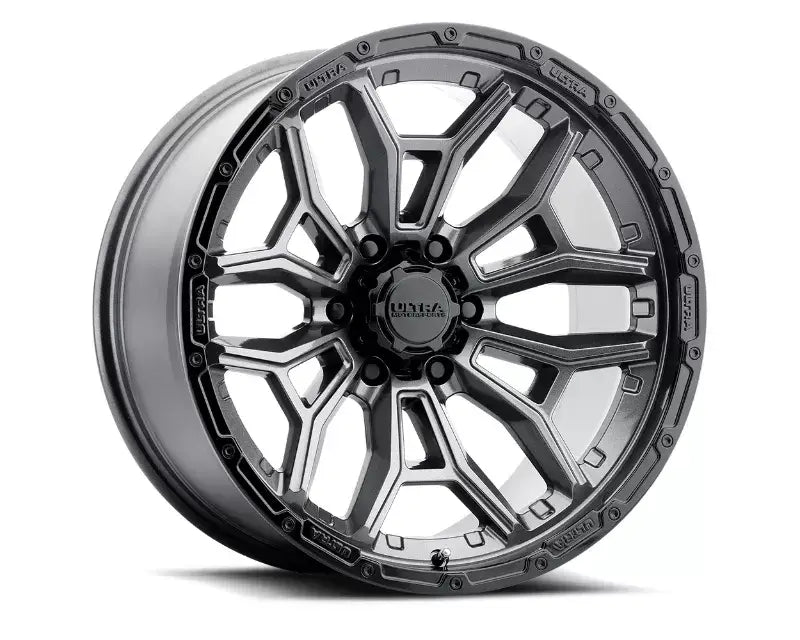 Gray and black Ultra Motorsports wheel on FT20487 Fabtech sway bar extension drvr