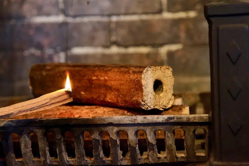 Green Mountain Firewood log burning in a fireplace, part of GMFW 8 PACK, showcasing clean and efficient burning for a cozy ambiance.