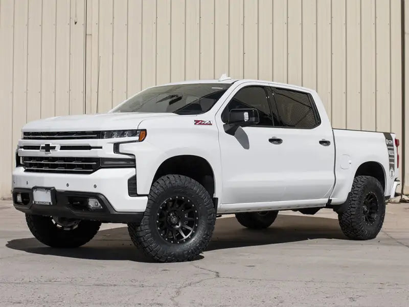 ICON 2019+ GM 1500 1.5-3.5in Stage 2 Suspension System with Tubular UCA installed on a white Chevy Silverado.