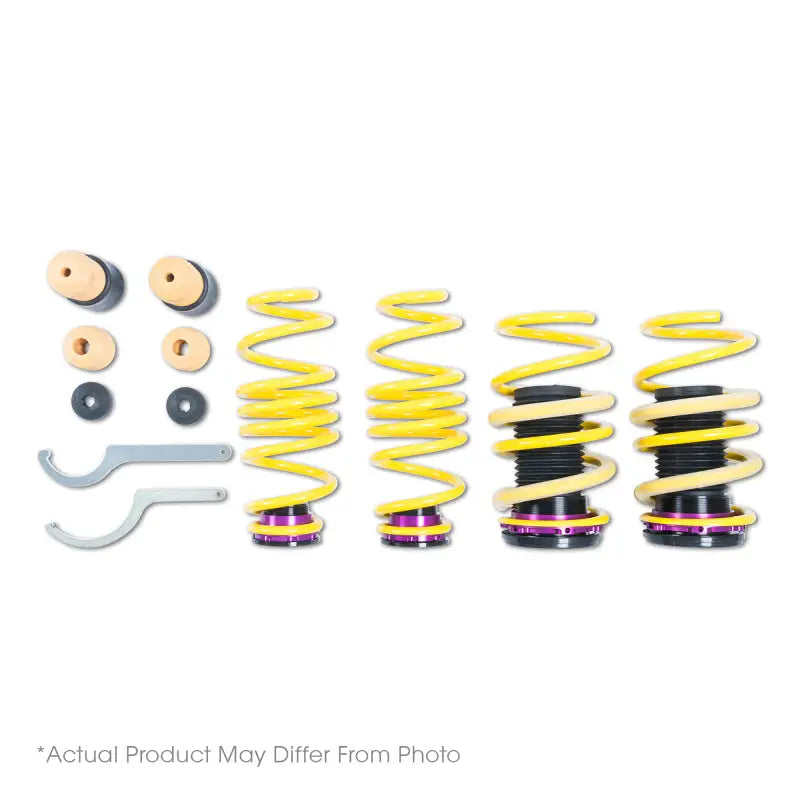 Yellow coilover suspension kit for Audi RS5 with electronic dampening and adjustable ride height