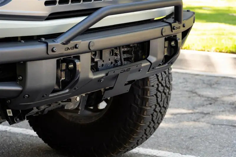 License Plate Relocation Kit Relocates Below The Center At An Angle On Front Bumper; Powder Coated; Black; Steel