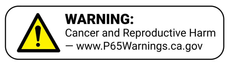 Warning label about cancer and reproductive harm on Mickey Thompson Classic III wheel