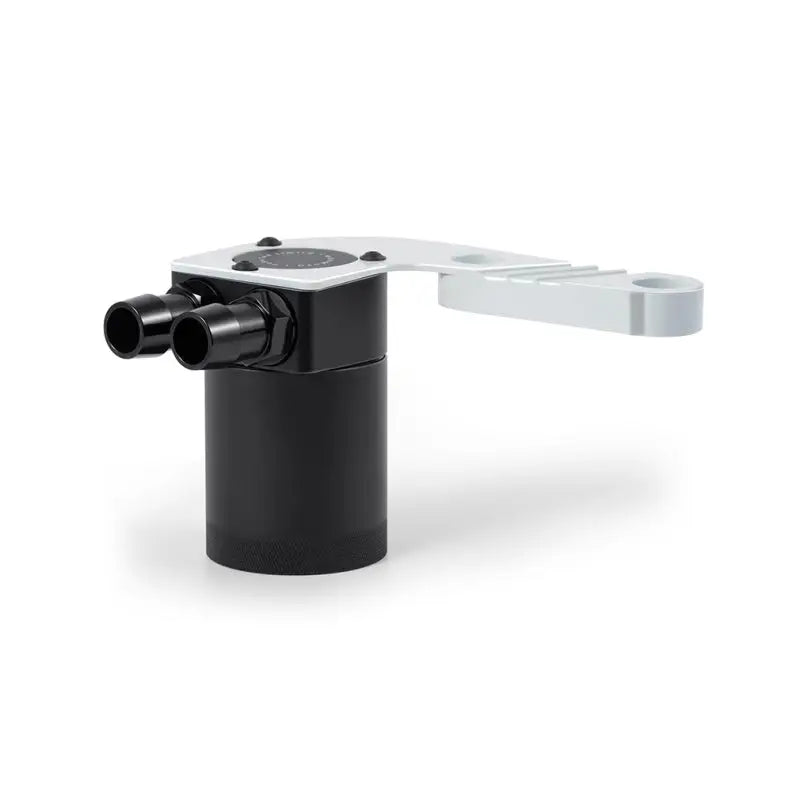 Black and silver baffled oil catch can for BMW F8X M3/M4 in Alpine White