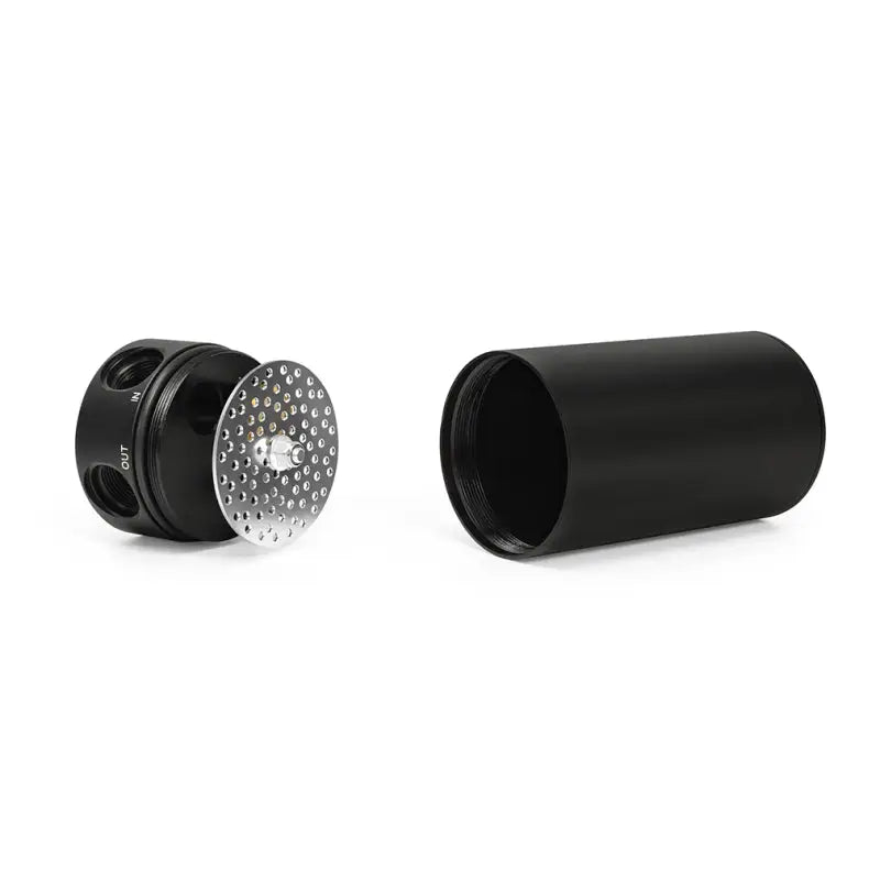 Black cylindrical Ford F-150 ecoboost oil catch can with perforated baffle for engine protection