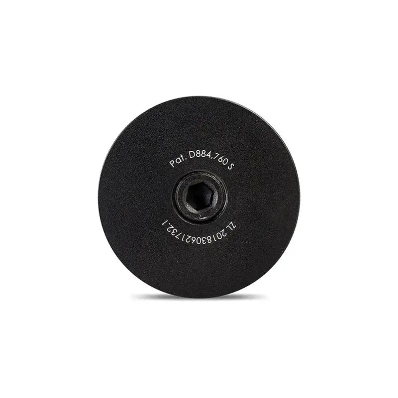 Black circular metal cap with hex recess for Subaru BRZ Toyota GR86 baffled oil catch