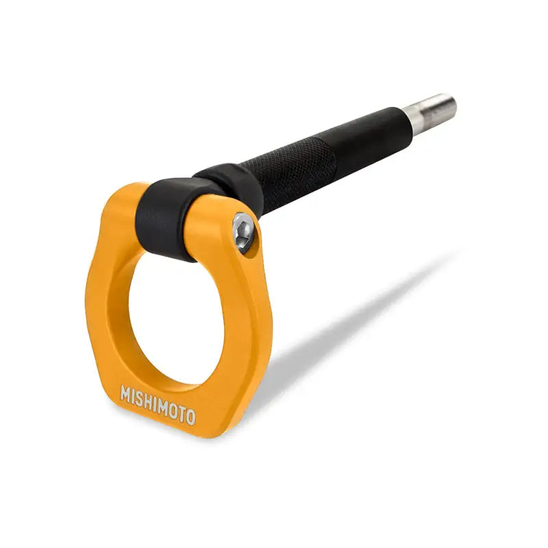 Yellow Mishimoto tow hook for Subaru WRX, adds style and utility with tow hook gold look