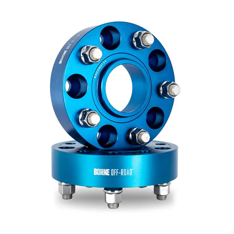 Blue Mishimoto Borne off-road wheel spacers with bolts for 5x127 wheels