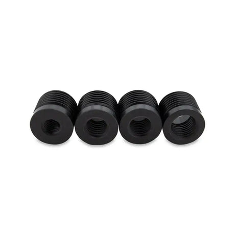 Four black Mishimoto XL shift knob thread adapters for easy shift knob installation