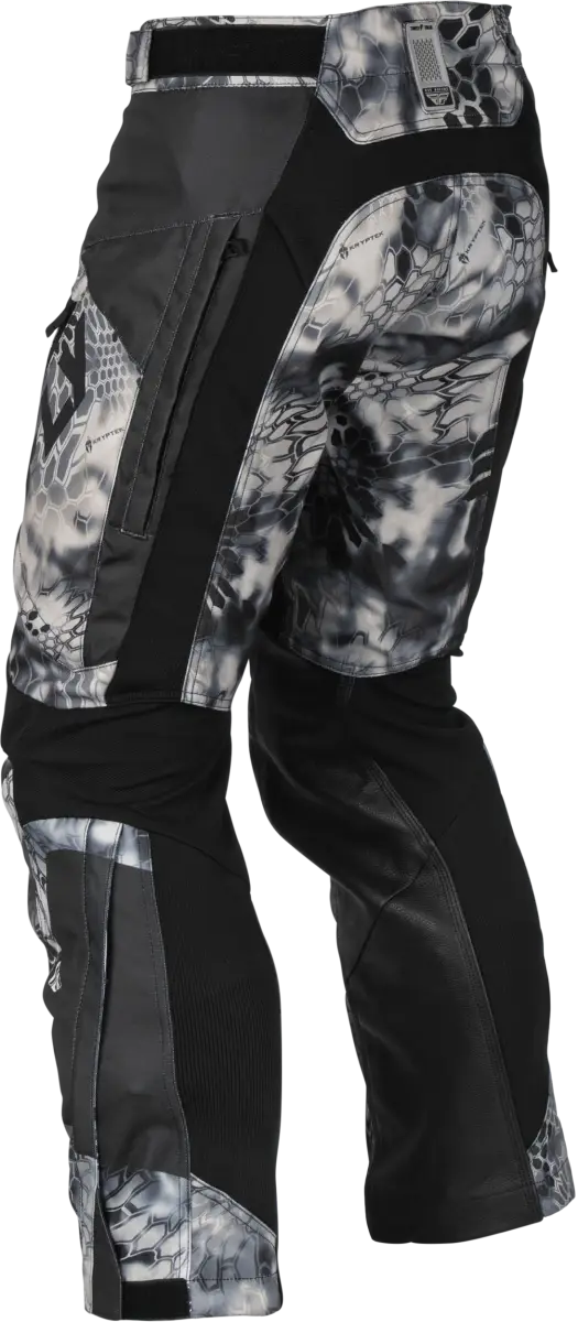 Black and white camouflage Patrol Kryptek Over Boot Pants with reinforced knees and easily accessible lower leg zippers