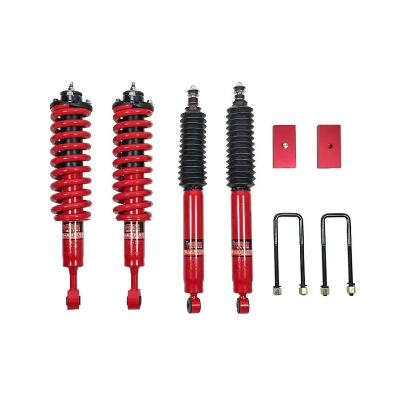 Red suspension lift kit components for Toyota Tacoma 50mm Trakryder Lift Kit