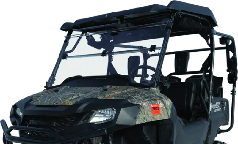 Camouflaged utility vehicle for Honda SXS700 Pioneer with folding windshield accessory